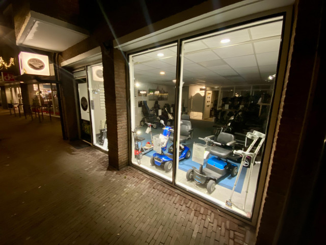 Storefront. Inside there's the world of mobility scootwrs