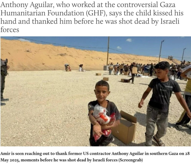 Anthony Aguilar, who worked at the controversial Gaza
Humanitarian Foundation (GHF), says the child kissed his
hand and thanked him before he was shot dead by Israeli
forces
Amir is seen reaching out to thank former US contractor Anthony Aguilar in southern Gaza on 28 May 2025, moments before he was shot dead by Israeli forces (Screengrab)
