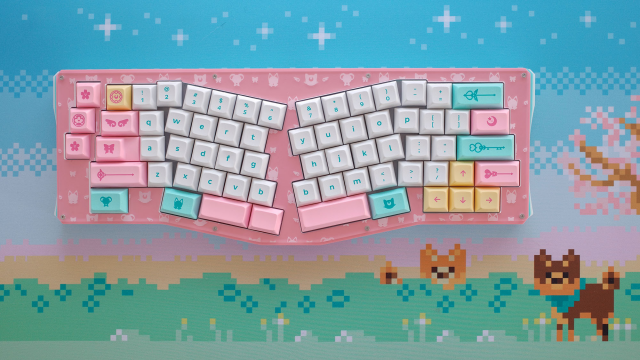 Pink, yellow, and mint green themed keycap set on Shiba Inu deskmat.