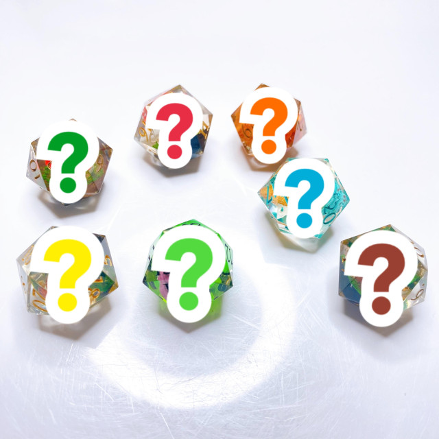 Seven of the standard size d20s I'll be giving away for free with orders, they all have colorful question marks obscuring the designs. Each one has a resin cast of a hand-sculpted object inside, but it's secret