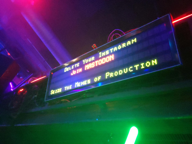 A digital sign that reads:

Delete Your Instagram
Join MASTODON
Sieze the Memes of Production