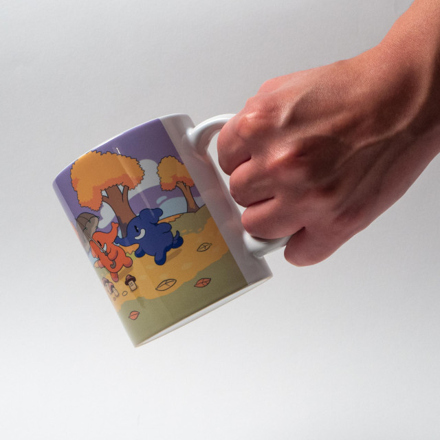 The same mug, but held in my wife's hand, so you can tell how large it is.