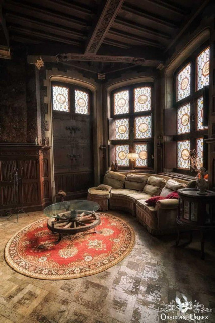 cosy living room, wooden panel walls and rustic furniture 