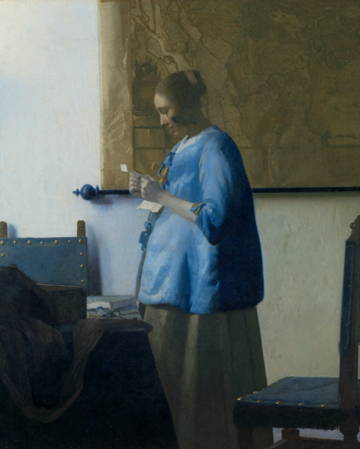 The central element of the painting is a woman in blue standing in front of a window (not depicted) reading a letter. The woman appears to be pregnant, although many have argued that the woman's rounded figure is simply a result of the fashions of the day. It is overall a study in many different shades of blue. 
