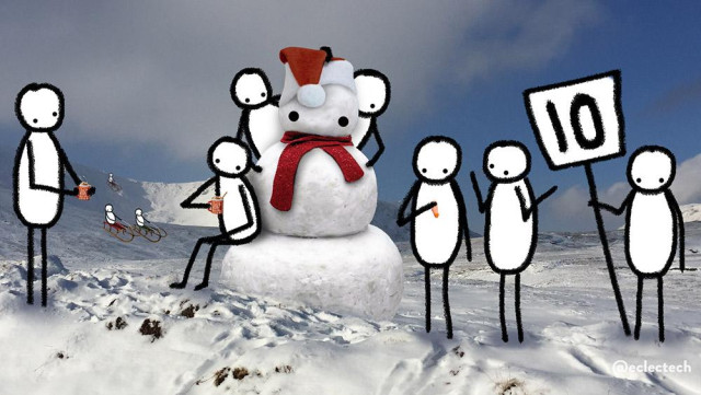 A photo of a snowy Scottish mountain top with blue sky and some light white clouds. Centre stage is a large snow person made of three balls of snow. It wears a red scarf and Santa hat. Around it is a group of simple scribbled figures. 

On the right one holds a placard reading 10. 

Next to them are a couple considering what the carrot is for (my wee folk have eyes, but no visible nose or mouth); one is holding a carrot while the other shrugs in confusion. 

Two have climbed up behind the snowman, peering from behind, and another sits on the edge of the wide bottom section, drinking a hot chocolate from a red mug. Another stands looking on, also drinking chocolate. 

In the distance three figures are on sledges on the snowy slopes.