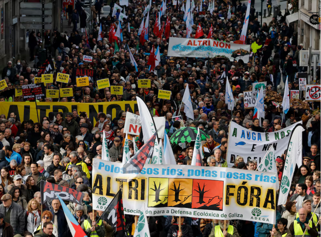 Streets full of people protesting to protect their local environment 