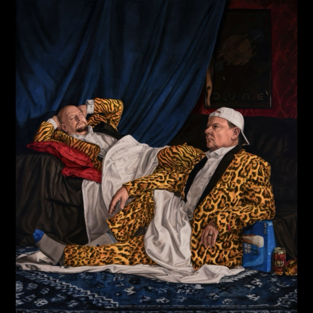 Subdued Dudes with Loud Suits is a meticulous oil painting showing a pair of bros wearing ridiculous animal print suits. The man in the tiger-striped outfit reclines on the sofa, whilst the leopard-print besuited dude reclines on the floor.