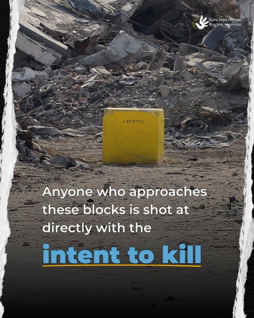 Picture of the yellow block standing in the rubble.

"Anyonen who approaches these blocks is shot at directly with the INTENT TO KILL"