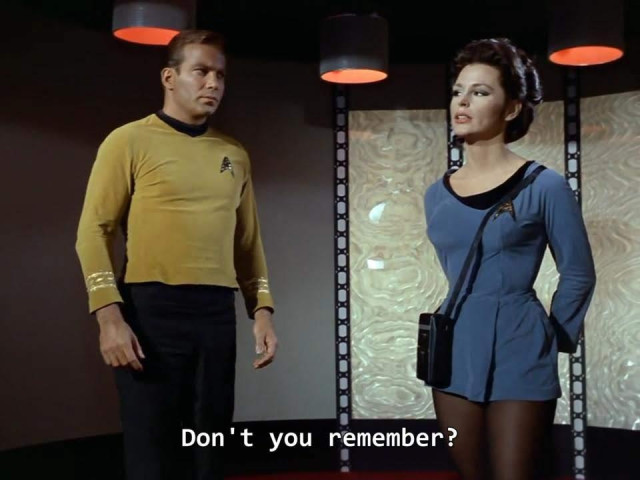 Star Trek The Original Series scene. We're in the ol' transporter room with the fun ceiling circles and trippy backdrop panels. Kirk and a lady officer, we'll call her Cheryl, are standing on the platform. He's turned towards and looking at her with some anxious energy it seems. She is looking straight forward, as if to purposefully not regard him. (Total power move) Closed caption reads:
Lady officer Cheryl: "Don't you remember?" 
Kirk: "The science lab Christmas party. Yes, I remember."