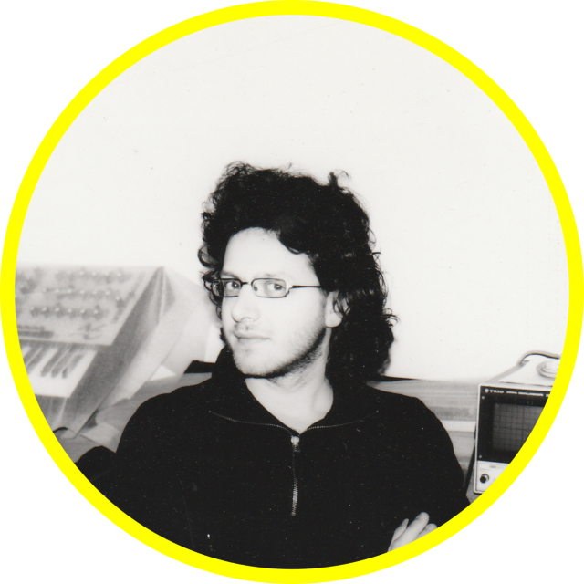 A glimpse inside the workspace: Giorgio flanked by his synthesizer and oscilloscope.