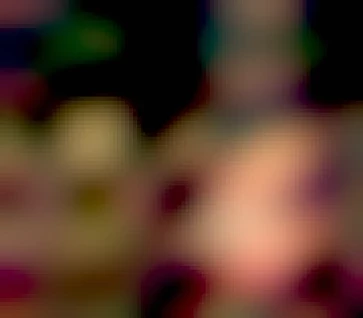 A stars and stripes on fire outside the US Embassy in Athens