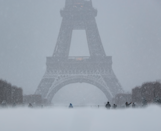 Eiffel Tower with snow and fog