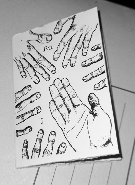 Black and white photo of an A5 zine

Front cover shows a gaggle of sketchy hands in a jungle of fingers and occasional thumbs

Title reads "Pat", with a Roman numeral "I" below