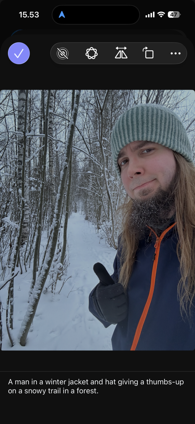 A screenshot: 15.53, AI generated caption below image: A man in a winter jacket and hat giving a thumbs-up on a snowy trail in a forest.
