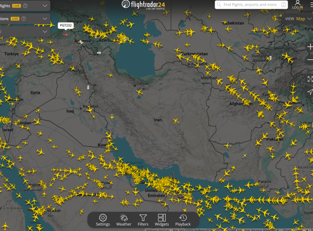 Screenshot of flightradar24.com showing the middle east and parts just east & north of Iran. Plenty of flights over Saudi, UAE, Oman, Turkey, Pakistan etc, but almost completely empty over Iran (and over Syria). 
Screenshot taken at 2026-01-13 22:50 UTC.