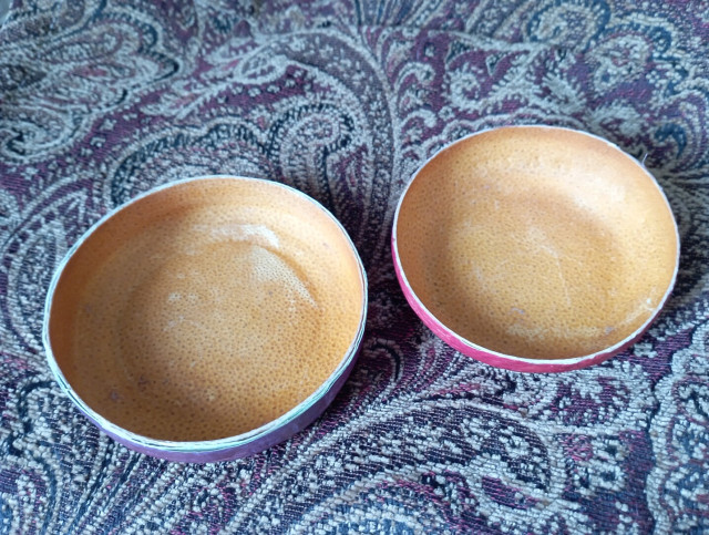 For comparison, here are the little bowls I made first. I wasn't able to turn the halves into a functional box, but I did a much better job of cleaning and inverting them. Third time lucky, I hope -- next time I'll try to photograph the steps.