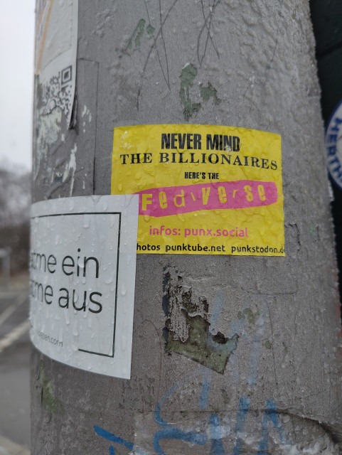 A sticker on a lamp post in Berlin - Tempelhof reads: Nevermind the billionaires. Here's the Fediverse