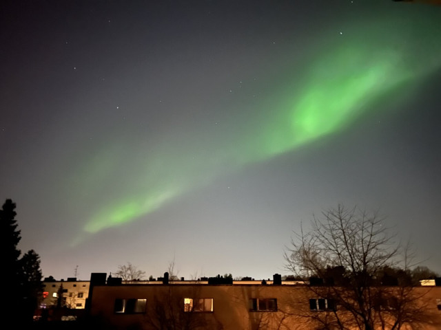 A bright green stripe on the sky