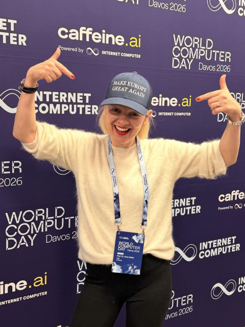 Woman poses with cap where it is written Make Europe Great Again