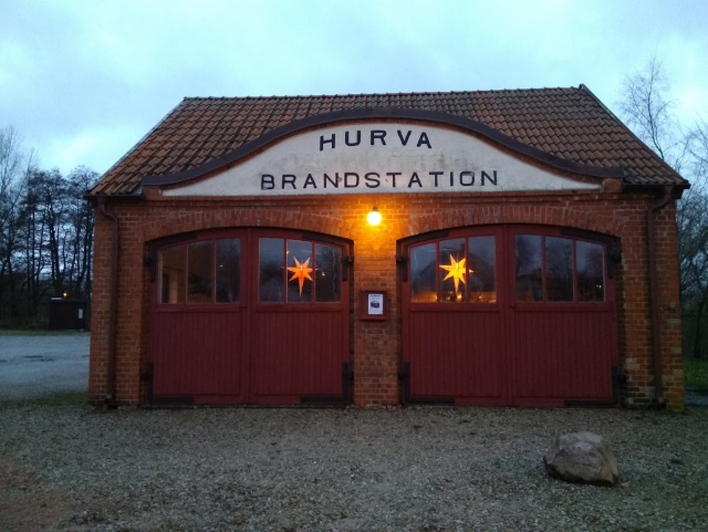 Hurva old Firedepartment building with to big garage doors.