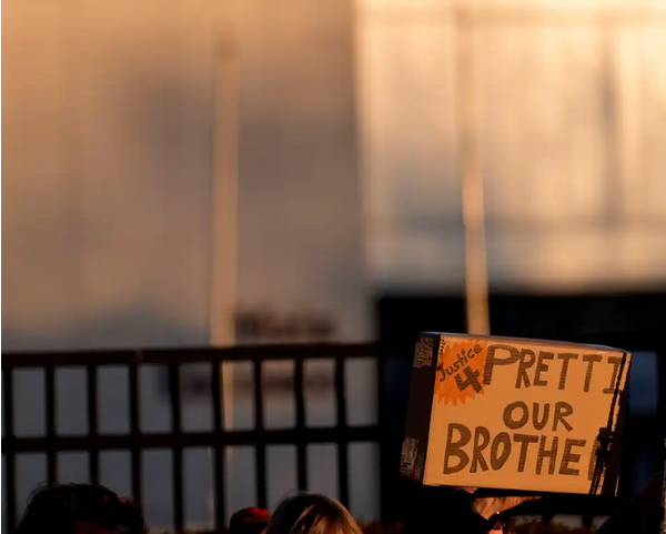 A placard from outside the Augusta vigil reads JUSTICE 4 PRETTI OUR BROTHER