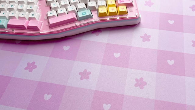 Pastel picnic themed deskmat in pink with flowers and hearts.