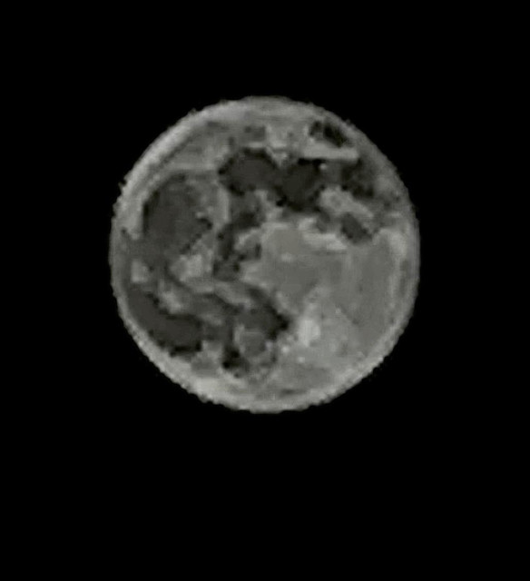 The supermoon of October 17, 2024. This was my first serious attempt to take a photo of the moon with its crater details. It had never really occurred to me before that I could do such a thing without sophisticated or expensive gear, but my cousin, who was with me at the time, suggested downloading the Black Magic Cam app onto my iPhone and trying it that way — capturing the moon on video and extracting a still image from that. I really had no idea what I was doing, and this is the extremely mediocre pixelated result. Still, it awakened my interest in moon photography and I’ve been chasing images of Luna ever since.