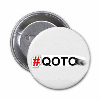 QOTO hashtag on a plain round badge