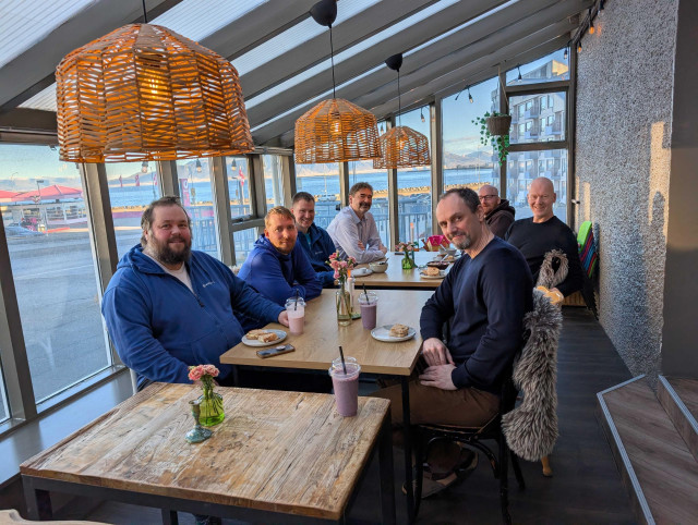 Vivaldi team at Arna cafe in Iceland. View to the ocean.