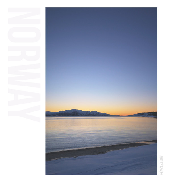 Last glow of light to the south as the sun disappears over the fjord.