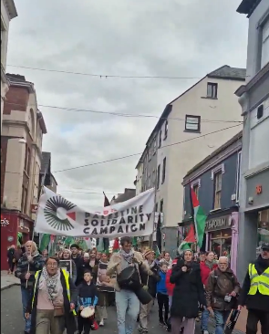 Crowds marching through Cork yesterday