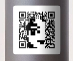 The default snac user avatar, Susie, black and white, embedded in a QR code sticker.