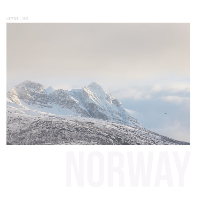 The view from our cabins, to Skorvetind, which stand tall above the fjord... but in this photo the clouds are trying to shroud them.
