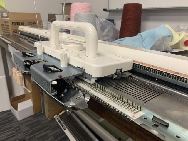 A closeup view of Jenny Lin's Silver Reed knitting machine at the University of Utah, Kahlert School of Computing.
