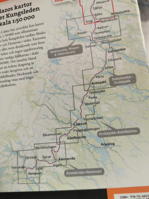 Detailed section of the Calazo map for Sweden’s Kungsleden trail, showcasing the route at a 1:50,000 scale. The map highlights key stages between Abisko and Hemavan, including notable stops such as Nikkaluokta, Saltoluokta, Kvikkjokk, and Ammarnäs. The marked trails wind through vast Arctic landscapes, with shaded areas indicating mountain huts and rest areas. The map’s intricate details and topographic lines evoke the adventure and planning essential for trekking one of Europe’s most iconic long-distance hiking routes.
