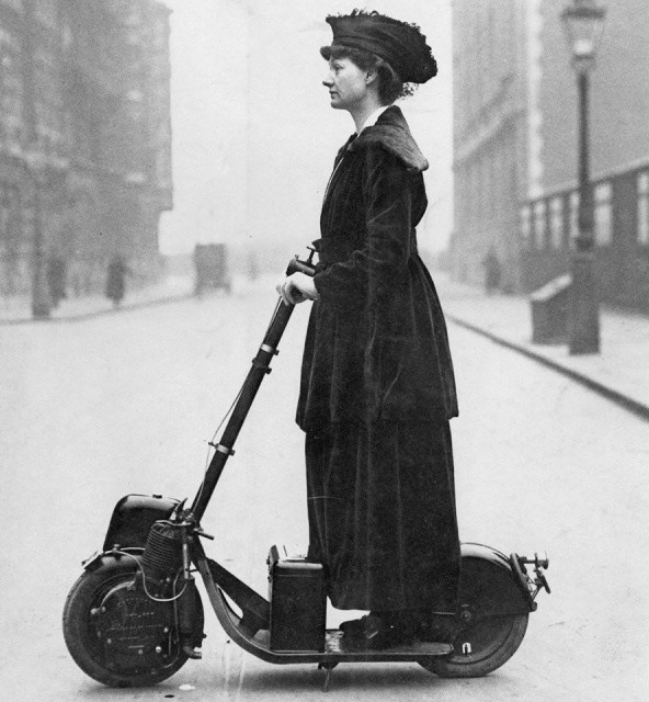 Lady Norman riding her Autoped (motorized scooter) 1916