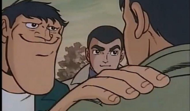Akakichi no Eleven meme image, in which a large-chinned man seems to be reassuring another character in the frame, smiling at him while placing his hand on his shoulder.