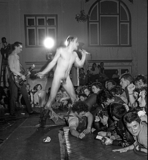 Dead Kennedys Mar 20, 1982
a view from the side of the stage Jello Biafra performing, the crowd had torn off his clothes a cruch of people against the stage, David Gallagher (that's me) crawling from the crowd
