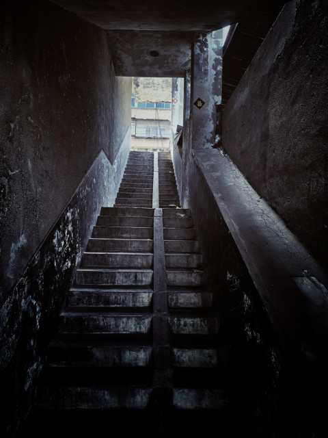 A dark, tanished passageway leading to the light.