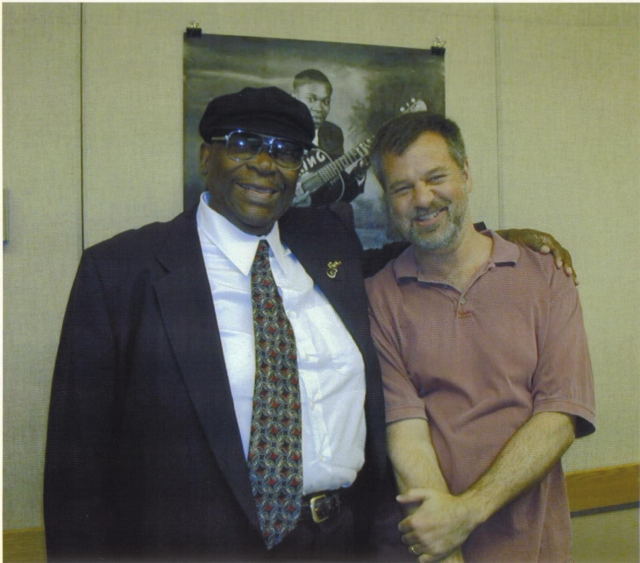 B.B. King puts his arm around a grinning Sam 