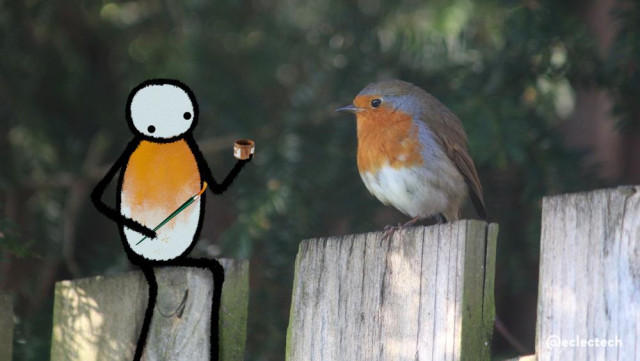 A combined photo and drawing. The photo is a Eurasian robin (orange-red face and front, pale underside, brown head, back and wings) sitting on a fence against a dark green blurred background. Drawn on the fence panel next to the robin is a simple figure holding a pot of orange paint and brush. They have painted their front orange to match the robin.