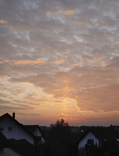 2: icy mist collecting golden above a red setting sun. Like its puffing out smoke vertically 