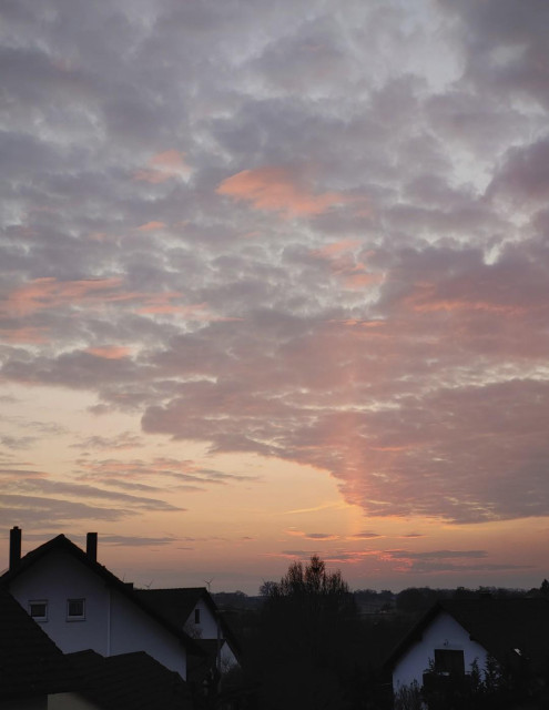 More pronounced after sunset, colours turning orange