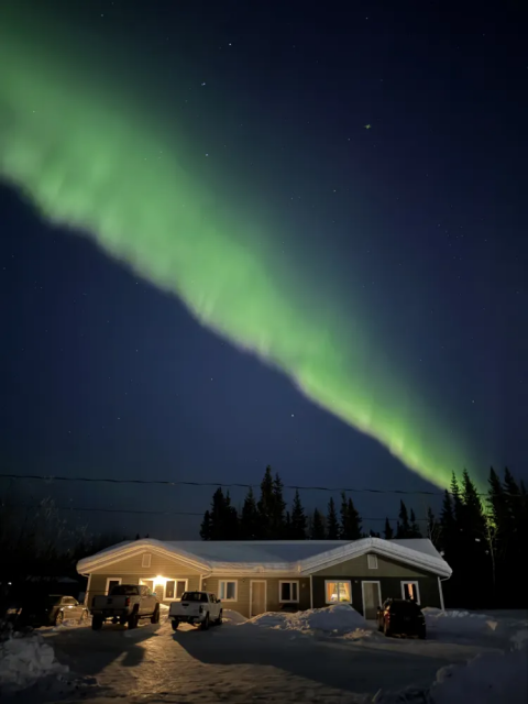 Explosion of Northern Lights in North Pole, Alaska tonight in brilliant green with some pink edges.