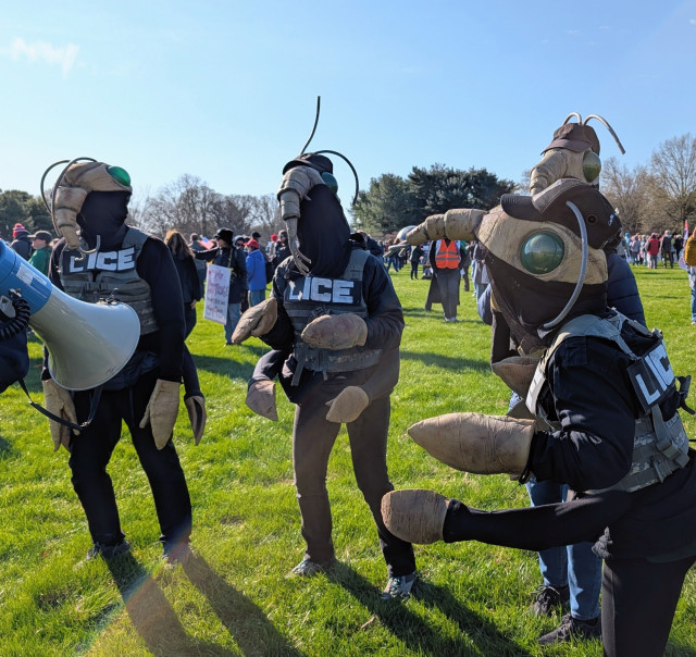 People dress up in costume as insects with ice vests