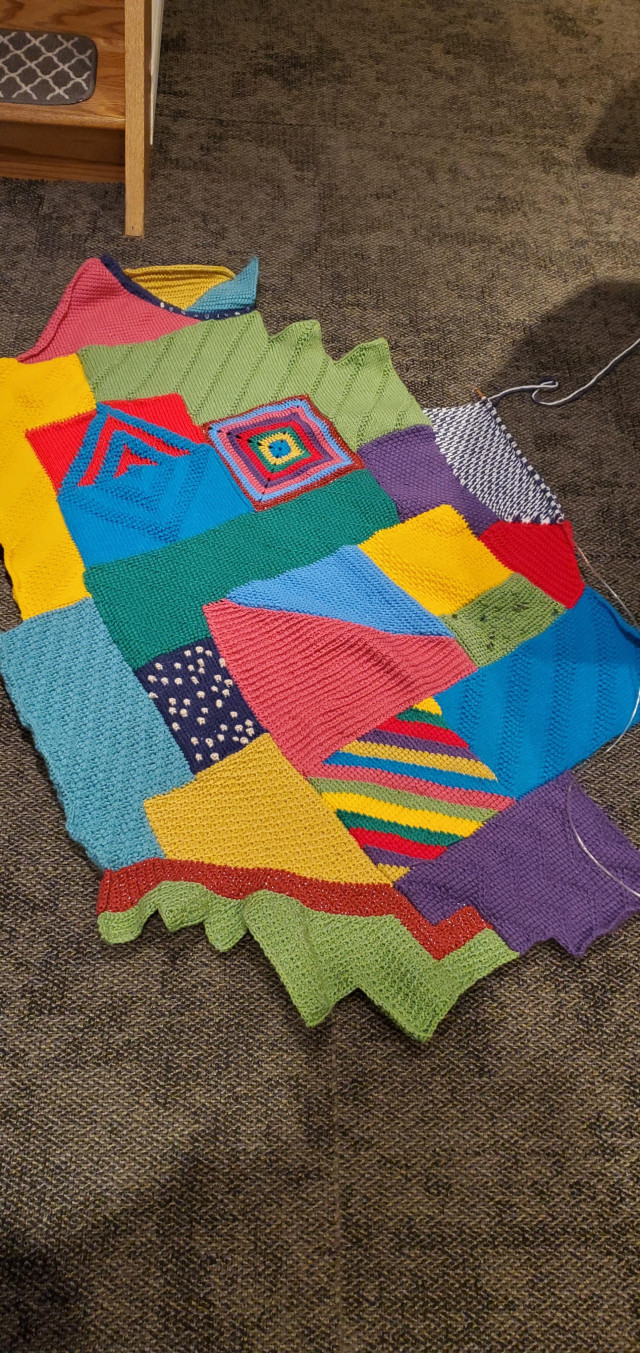 Multicoloured crocheted afghan work in progress