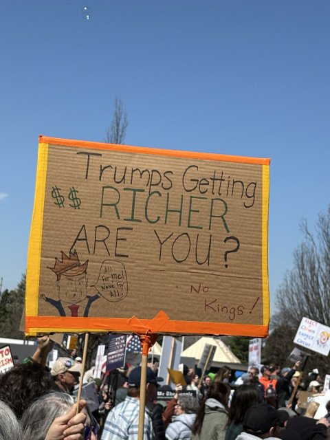 Protest sign seen at No Kings 3/28/26: Trump’s getting richer. Are you?
