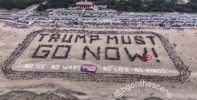 Still of the drone video of the #NoKings human banner in #SanFrancisco at Ocean Beach.

Message reads “TRUMP MUST GO NOW!" 

I'm in the bottom right "W" Spocko

From Brendan Gutenschwager @BGOnTheScene@pleroma.salastil.com 