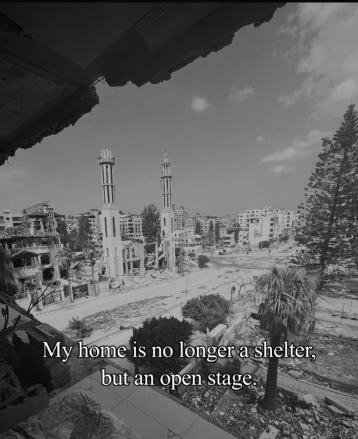 A view from what used to be my bedroom. No walls remain, leaving the room completely open to the rainy sky. This is what I see every day