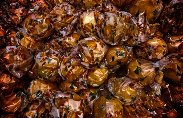 Bright orange, individually wrapped fruit